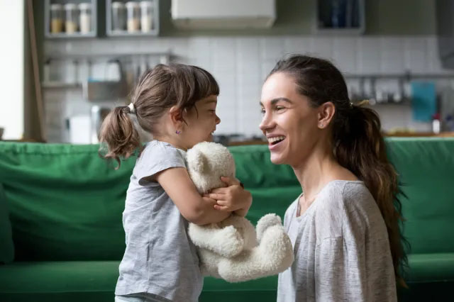 a mom and daughter playing one of our favorite indoor games
