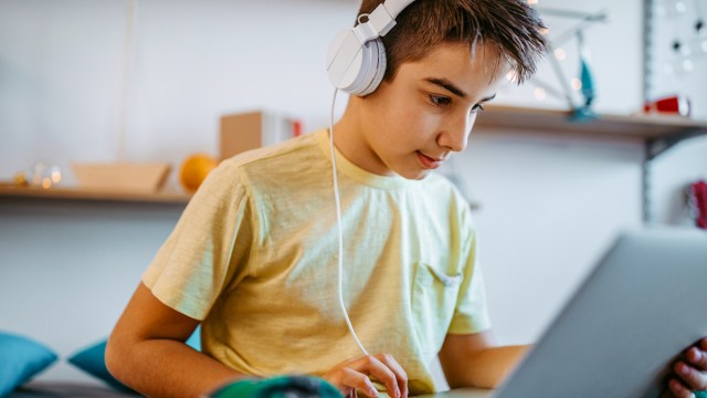 boy playing typing games