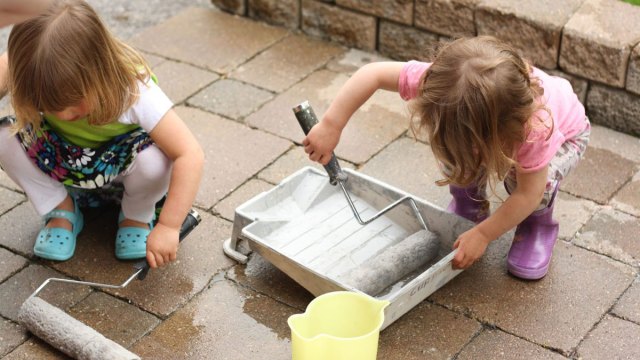 adorable kids doing outdoor art